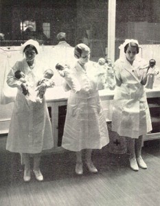 Nurses from an exhibition at Coney Island hold up the premature infants in their care. Courtesy of neonatology.org.