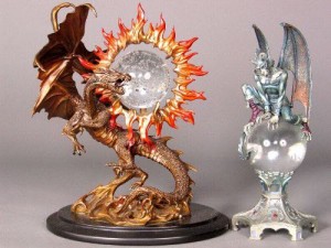Two by the Franklin Mint "Dragon of Triumph" by Jule Bell (left) and Guardian of Destiny" by Gary Persello (right)