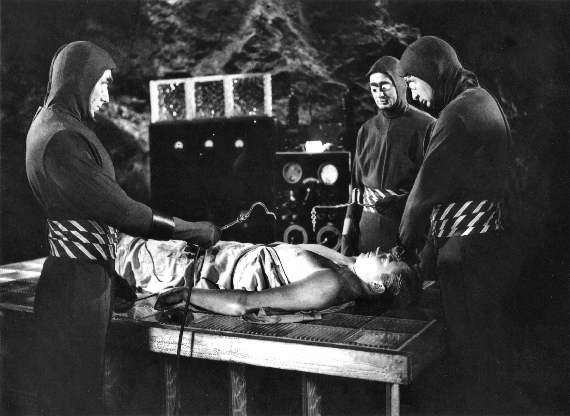 Figure 6 - Operating table with Martin (Graves) and Bug-Eyed Aliens CENTER